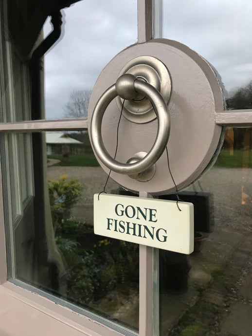 gone fishing door sign
